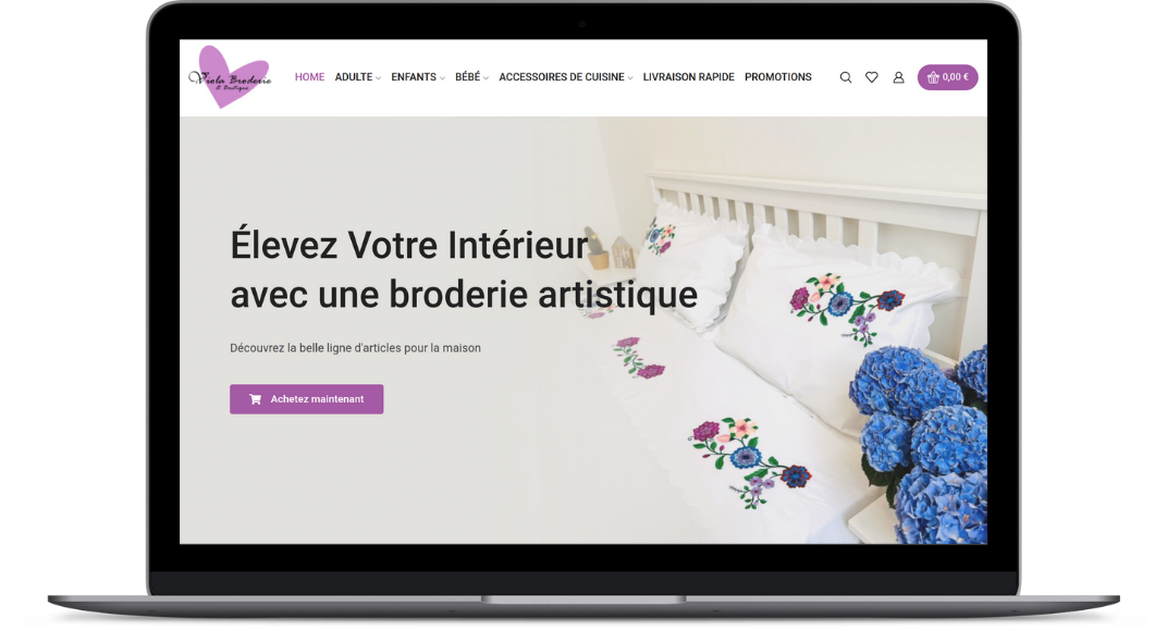 Laptop që shfaq kryefaqen e Broderie Viola